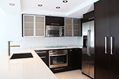 Kitchen with brown cabinets